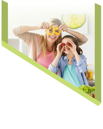 Woman and daughter playing with vegetables