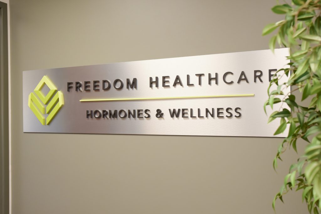Freedom Healthcare sign on wall